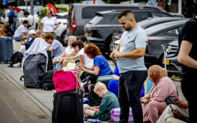 Travelers at Rotterdam The Hague Airport. The airport is experiencing major problems due to the global computer failure. According to a spokesperson, it is currently not possible for most passengers to check in.