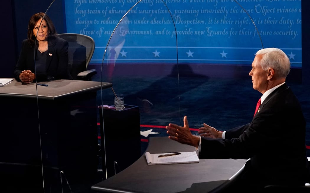 Vice President Mike Pence and Democratic vice presidential nominee Kamala Harris speak during the vice presidential debate on October 7, 2020, at Kingsbury Hall on the campus of the University of Utah in Salt Lake City.