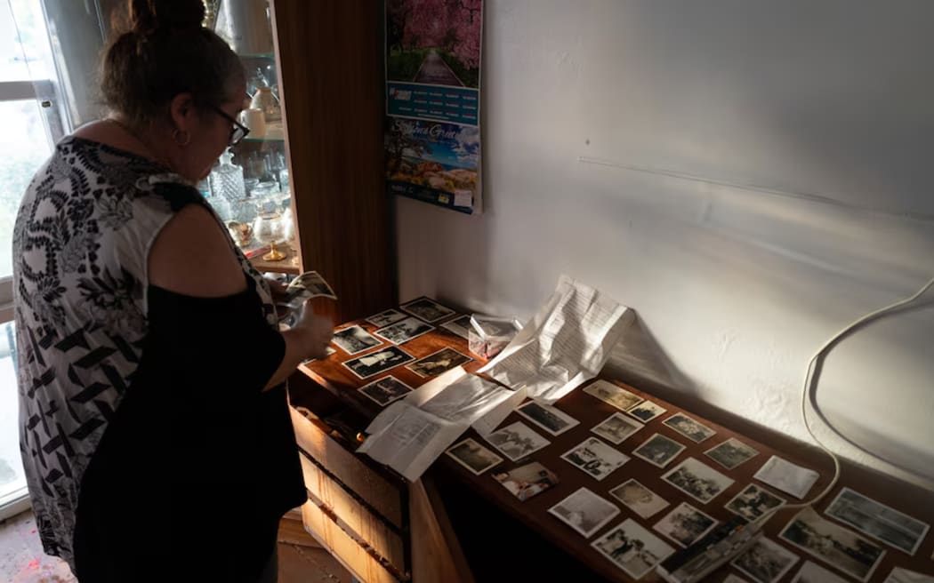 Anneke Wicks tried to salvage what was left of her dad's belongings.