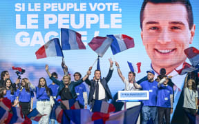 Marine Le Pen (front left), President of the National Rally group in the National Assembly with Jordan Bardella (centre), President of the National Rally during a pre-European Parliament election, at Le Dôme de Paris - Palais des Sports, on 2 June, 2024, in Paris, France.