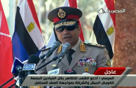 General Abdel Fattah al-Sisi during a live TV broadcast.