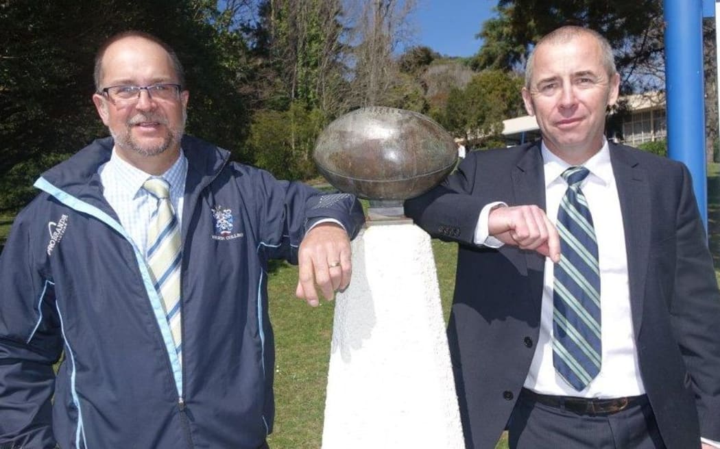 Nelson College director of community relations Mark Vinsen and deputy headmaster Tim Tucker (right) at the monument to rugby's birthplace in Nelson.