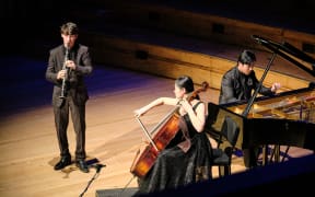 Trio Chicago performing on stage at Auckland Town Hall