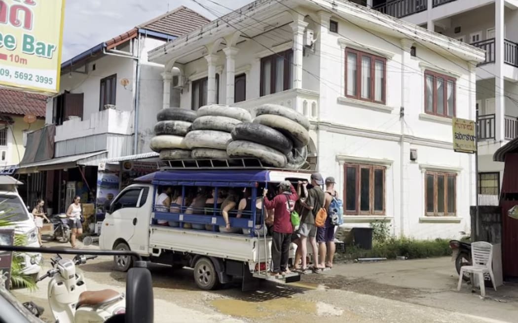 Vang Vieng is popular among backpackers who traditionally go tubing down the Nam Song river.  (ABC News)
