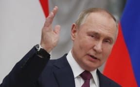 Russian President Vladimir Putin gestures as he talks during a press conference with Hungarian Prime Minister after their meeting at the Kremlin in Moscow on 1 February, 2022.