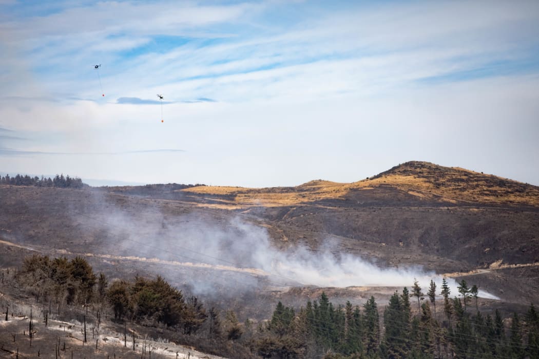 Fire crews battling the Port Hills fire in Christchurch for a second day, on 15 February, 2024.