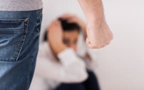 domestic violence, abuse and people concept - man beating helpless woman at home
