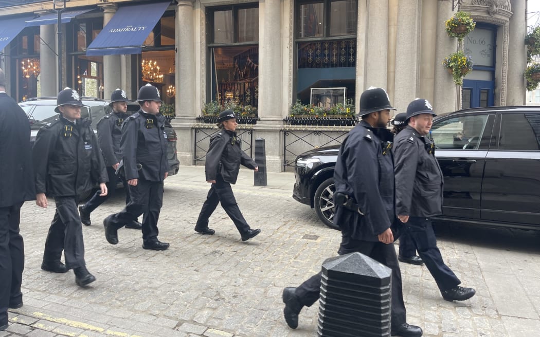 Police in London as the Coronation day dawns.