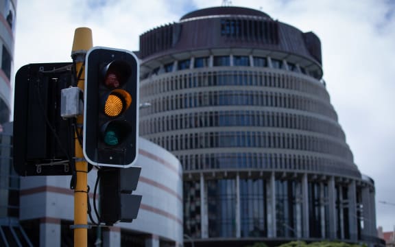 Orange Traffic Light in front of Parliament