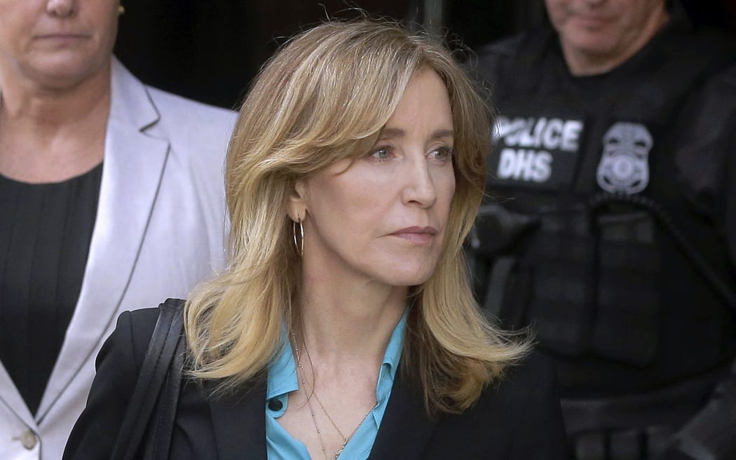 Actress Felicity Huffman arrives at court to face charges in college bribery scandal 3 April 2019