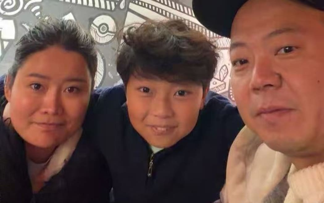 Chunxiang Chen with her husband Allen Lu and stepson Yichen Lu.