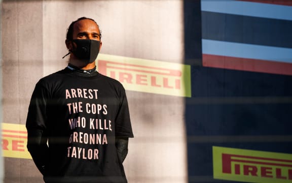Lewis Hamilton wears protest t-shirt.