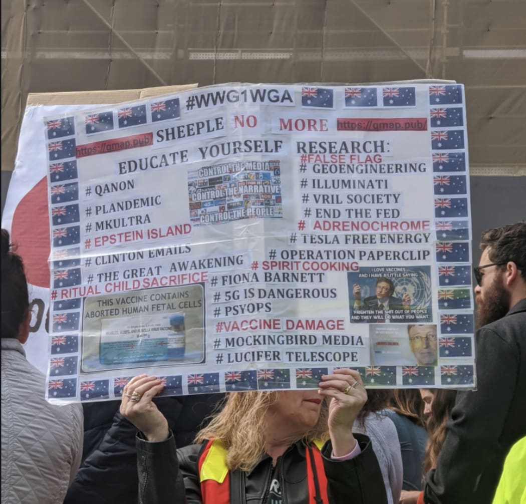 A protestor lists a host of conspiracy theories at an anti-lockdown protest in Melbourne.