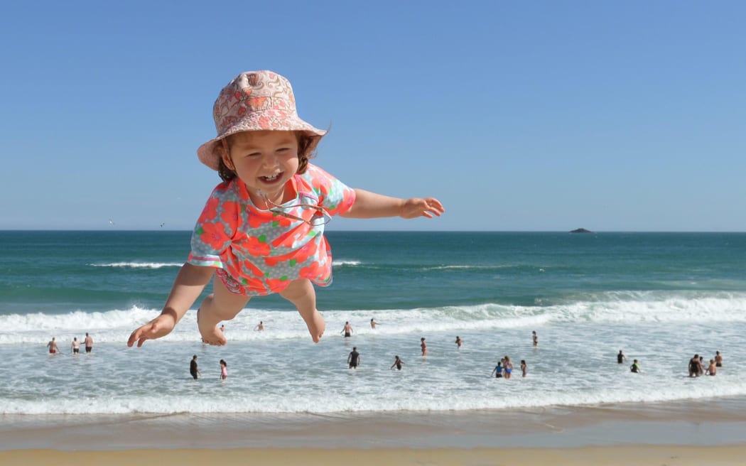 Flying visit . . . Olivia Naziris (20 months), from Wellington was one of many people who enjoyed the Dunedin beaches over the Christmas weekend. Hoisted high over St Kilda beach by her father Christopher, they were in Dunedin visiting family during the holidays.

2016 calendar