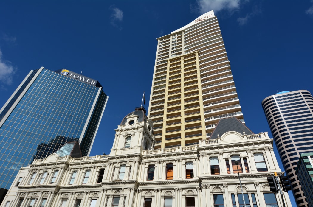 Auckland old Customhouse under modern building. Since the 19th century European settlement Auckland become the fastest-growing and commercially dominating city of New Zealand