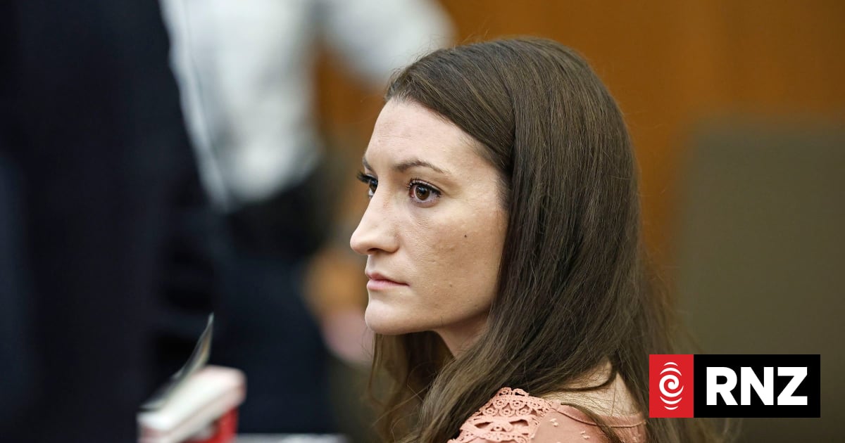 Lindsay Clancy Caption: Lindsay Clancy watches as the jury enters the courtroom during her murder trial on Monday in