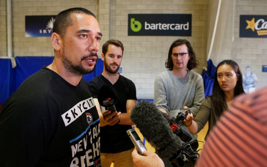 Breakers coach Paul Henare talks to the media.