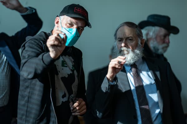 Rob Sarkies on set with actor Arthur Ranfurd playing Nigel Hampton KC.