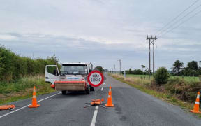 Cordon at intersection of Eltham and Hastings Roads.