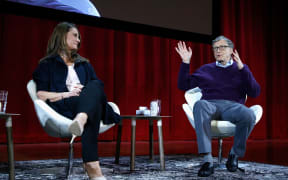 (FILES) In this file photo taken on February 13, 2018 Melinda Gates and Bill Gates speak during the Lin-Manuel Miranda In conversation with Bill & Melinda Gates panel at Hunter College in New York City. -