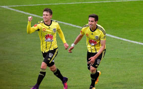 Phoenix's Michael McGlinchey (L) celebrates scoring a goal with team mate Alex Rodriguez.
 during the A-League - Phoenix v Central Coast Mariners football match at Westpac Stadium in Wellington on Saturday the 14 January 2017.
