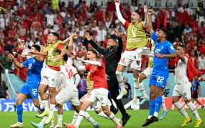 Morocco players celebrate after Morocco's win over Belgium at the Qatar 2022 World Cup