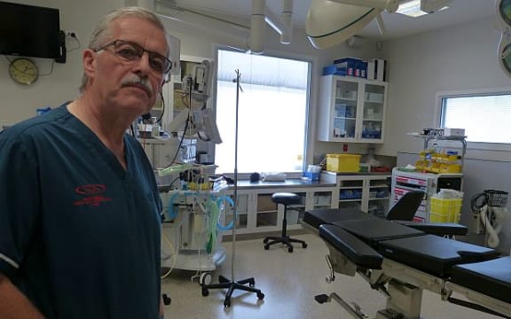 Christchurch surgeon, Philip Bagshaw, in an operating theatre at the city's charity hospital.