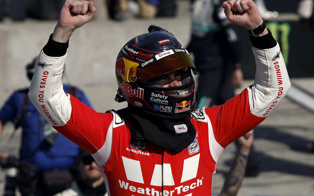 New Zealand driver Shane van Gisbergen celebrates a NASCAR win.