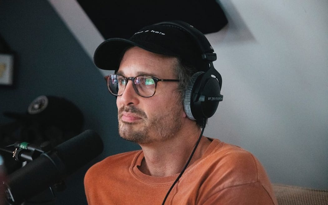 New Zealand journalist David Farrier recording an episode of the podcast Armchaired & Dangerous