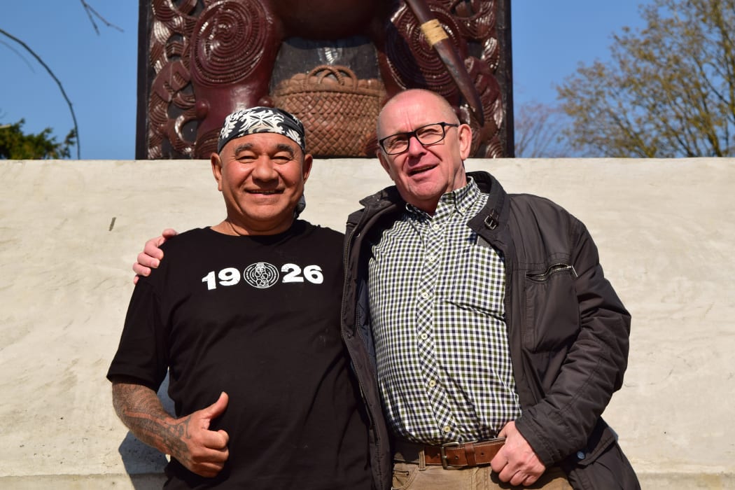 Master carver James Rickard with Freddy Declerck, who has spent more than a decade raising awareness about New Zealand's role in the Battle of Passchendaele and the Western Front.