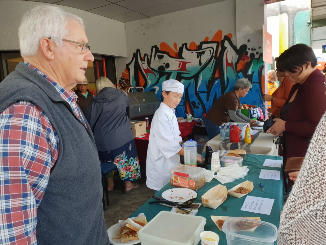 11 year old chef Rahiri Reihana and grandad at the mandate BBQ.