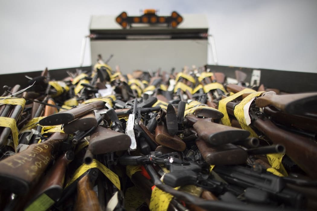 Guns fill the bed of a dump truck during the destruction of approximately 3,400 guns and other weapons at the Los Angeles County Sheriffs annual gun melt The weapons, confiscated in various law enforcement operations, will be recycled in the form of steel rebar to be used in construction.