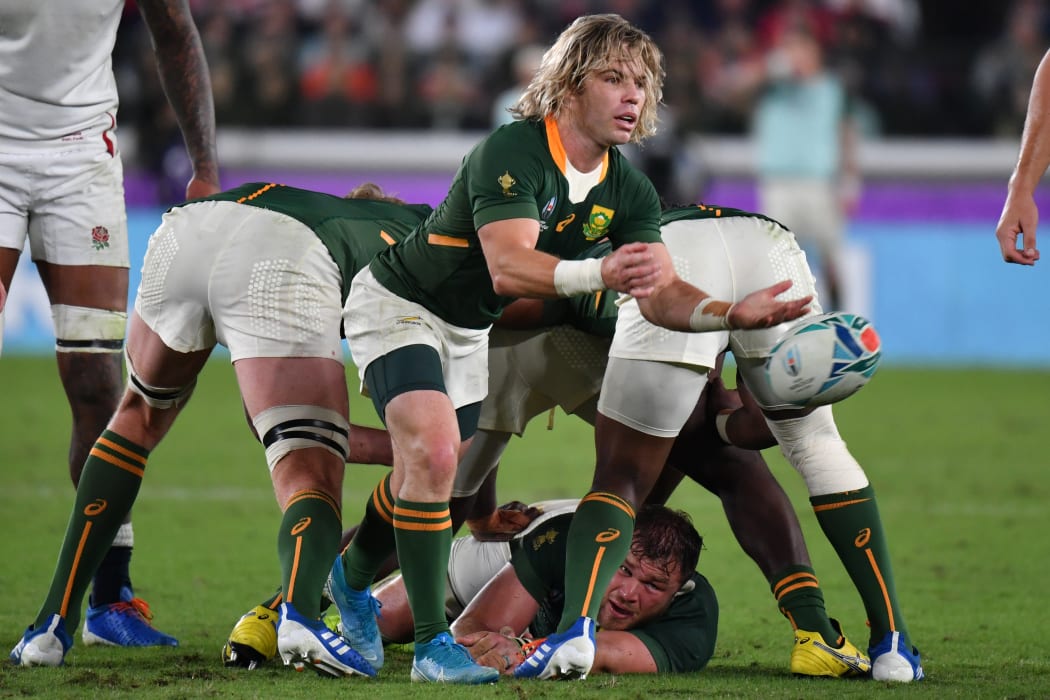 Faf de Klerk passes the ball during the Japan 2019 Rugby World Cup final match between England and South Africa in Yokohama.