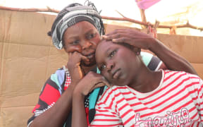 Returnee families at a transit camp in Sudan.