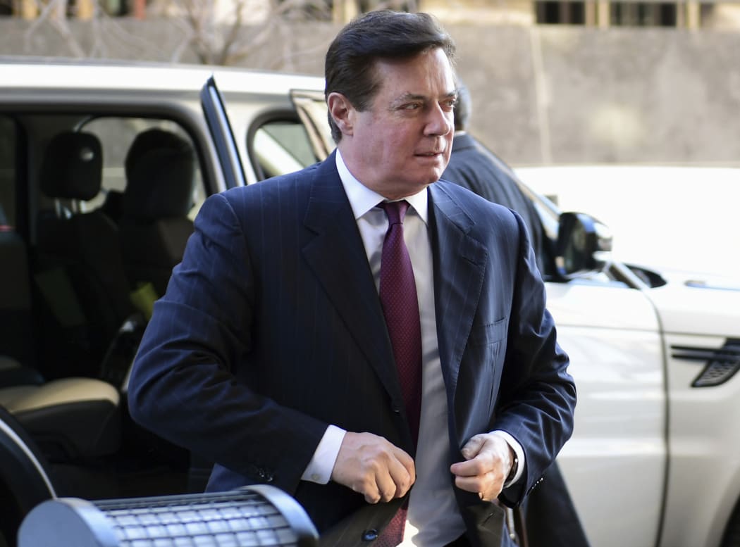 FILE - In this Dec. 11, 2017, file photo, former Trump campaign chairman Paul Manafort arrives at federal court in Washington. Prosecutors in New York City are building a potential criminal case against Manafort,