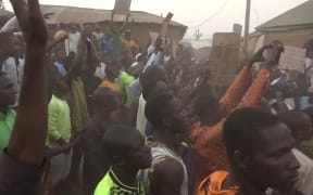 This video grab taken from an AFPTV video on March 7, 2024 shows families of abducted pupils gathering during the visit of the Kaduna State governor Uba Sani after gunmen kidnapped over 280 from a school in Kuriga. Gunmen have kidnapped more than 200 pupils during a raid on a school in northwest Nigeria, a teacher and local residents said, in one of the country's largest mass abductions.
Kidnappings for ransom are common in Africa's most populous country, where heavily armed criminal gangs have targeted schools and colleges in the past, especially in the northwest, though such attacks have abated recently.
Local government officials in Kaduna State confirmed the kidnapping attack on Kuriga school on March 7, 2024, but gave no figures as they said they were still working out how many children had been abducted. (Photo by AFPTV / AFP)