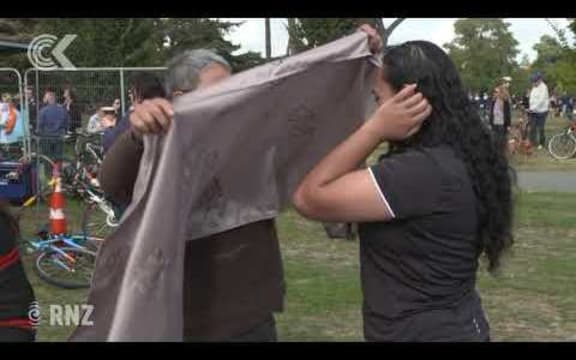Hundreds of scarves handed out at National Remembrance Service