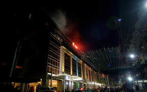 A gunman fired shots and set gaming tables alight at Resorts World Manila just after midnight local time.