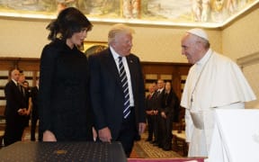 Donald and Melania Trump meet the Pope.