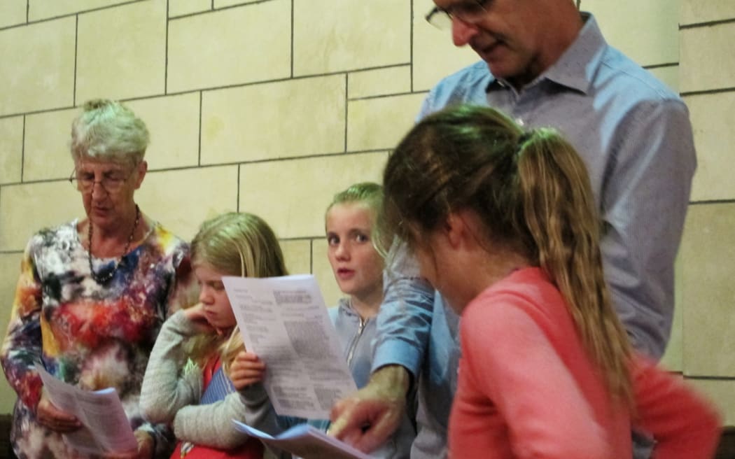 A family group in the St Luke's Church congregation, Remuera, Auckland.