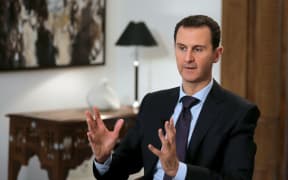 Syrian President Bashar al-Assad in an exclusive interview with AFP in the capital Damascus 11 February 2016.
