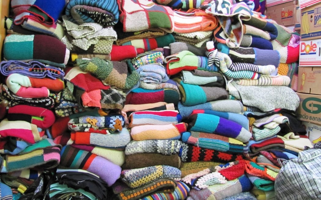 Operation Cover Up - Knitted blankets waiting to be shipped to Eastern Europe