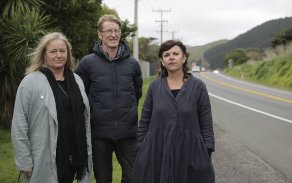Kāpiti Coast Deputy Mayor Janet Holborow, NZTA regional transport systems manager Mark Owen and Paekākāriki community board member Holly Ewens at one of the traffic hotspots.