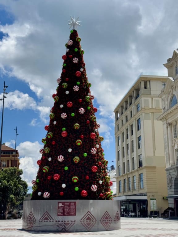 The Te Manaaki tree in central Auckland is 18 metres tall, with more than 10,000 LED lights and 200 giant baubles.