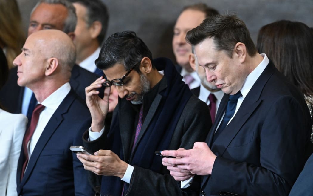 From left, Amazon founder Jeff Bezos, Google CEO Sundar Pichai and Tesla and SpaceX CEO Elon Musk attend the inauguration ceremony before Donald Trump is sworn in as the 47th US President in the US Capitol Rotunda in Washington, DC, on 20 January 2025.