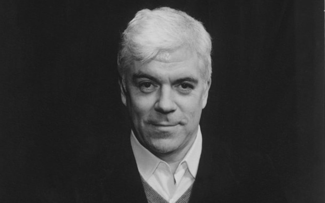 A black and white protrait of Tim Blanks, the editor-at-large of fashion magazine The Business of Fashion