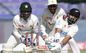 New Zealand's Ajaz Patel plays a shot during the second cricket Test against Pakistan in Karachi, 2023.