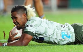 Folau Fakatava scores a try for the Highlanders