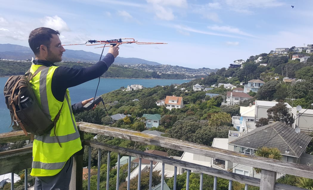 Henry Mackenzie tracks radio-collared rats in the Wellington suburb of Roseneath.