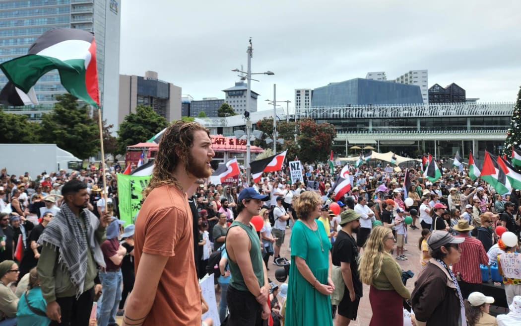 Crowds converge on Auckland's Aotea Square for a 'All Out For Palestine' march Sunday.